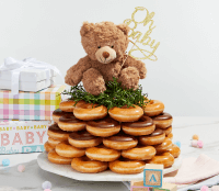Baby shower themed doughnuts stacked